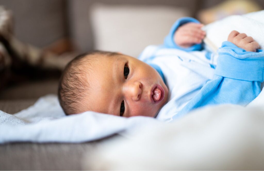 White residue around the lips and mouth that doesn't wipe away cleanly is often one of the first things parents notice with oral thrush.